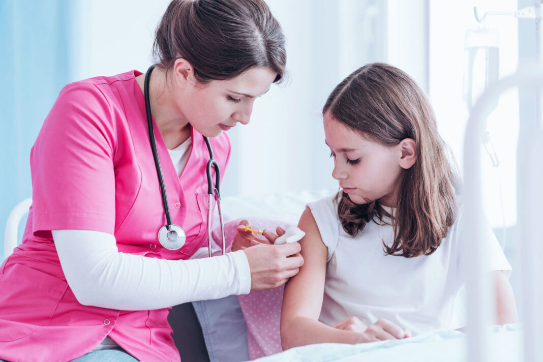 Nurse giving an injection